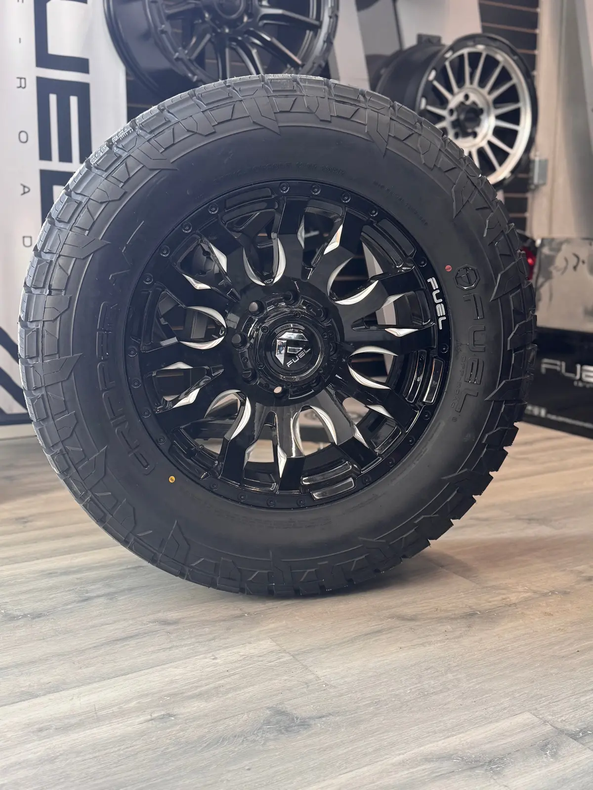 (Set Of Four) Fuel Blitz Gloss Blk Milled 20X9 8X165.1 +20 125.1Mm | 35X12.50R20 Fuel Gripper At 1