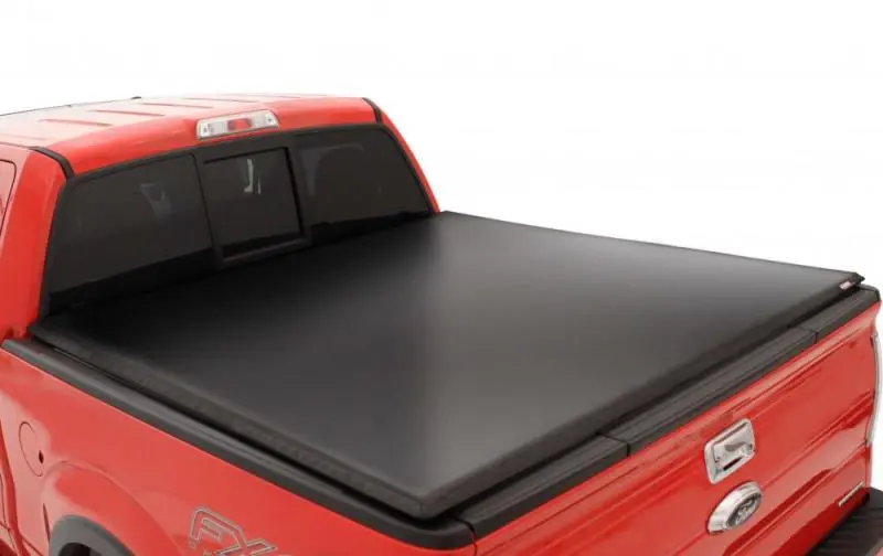 Lund Genesis Tri-Fold Tonneau Cover — Custom Fit For 2005–2015 Toyota Tacoma (5-Foot Bed), Matte Black 1