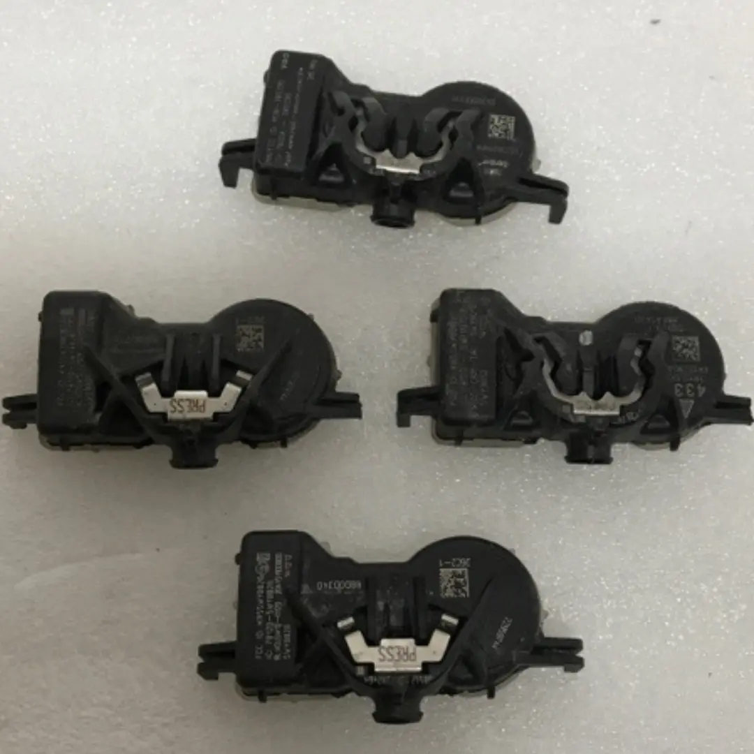 Set Of 4 Cadillac Tpms Sensor 315 Mhz 22959744  A04c334c 1