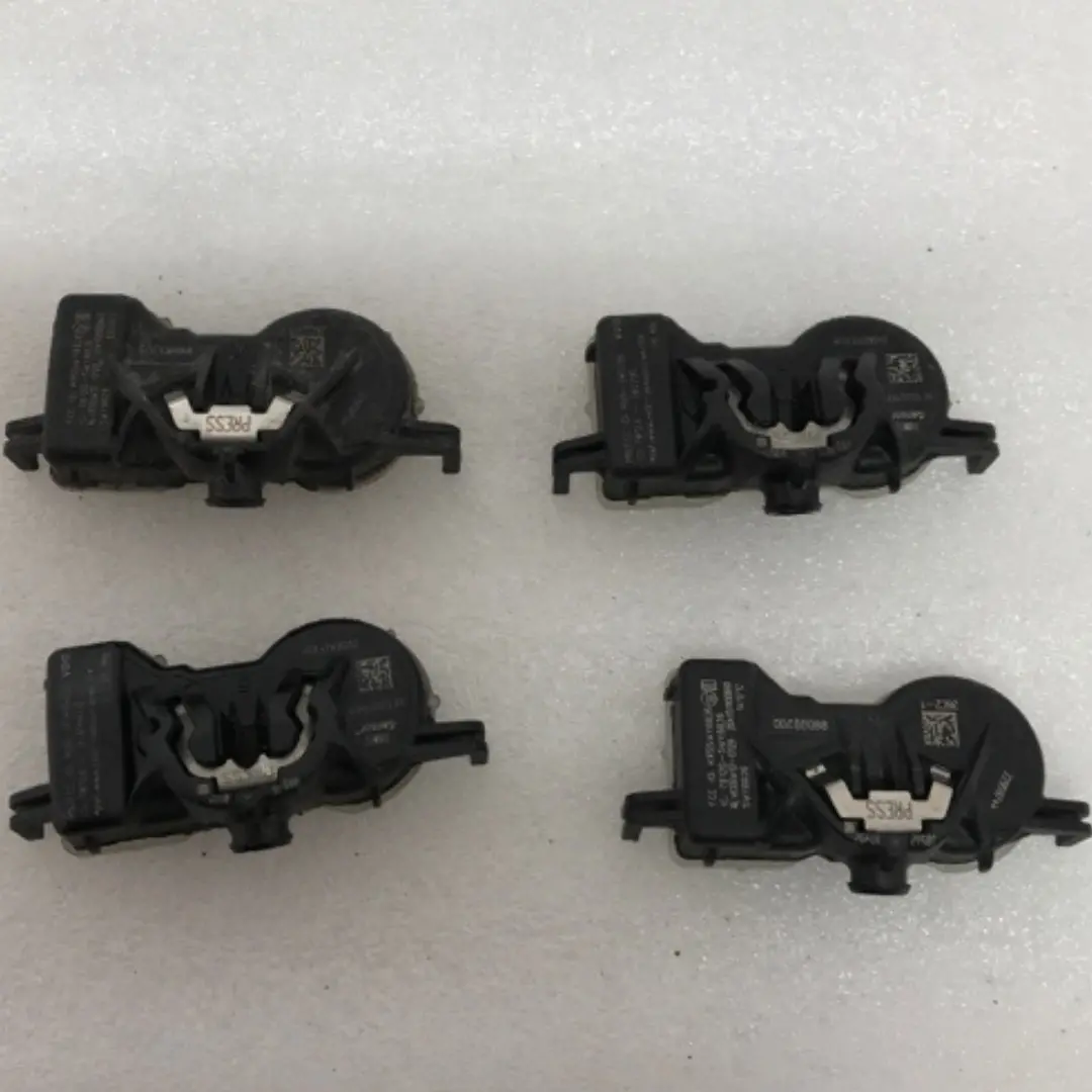 Set Of 4 Cadillac Tpms Sensor 22959744 B770a6cc 1