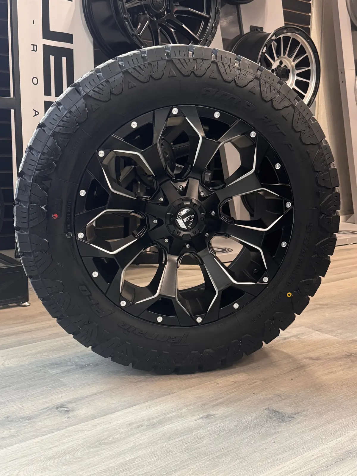( Set Of Four ) Fuel Assault Matte Black Milled 20X9 +20 6X135/6X139.7 | Lt 275/60R20 Amp Terrain Pro 1