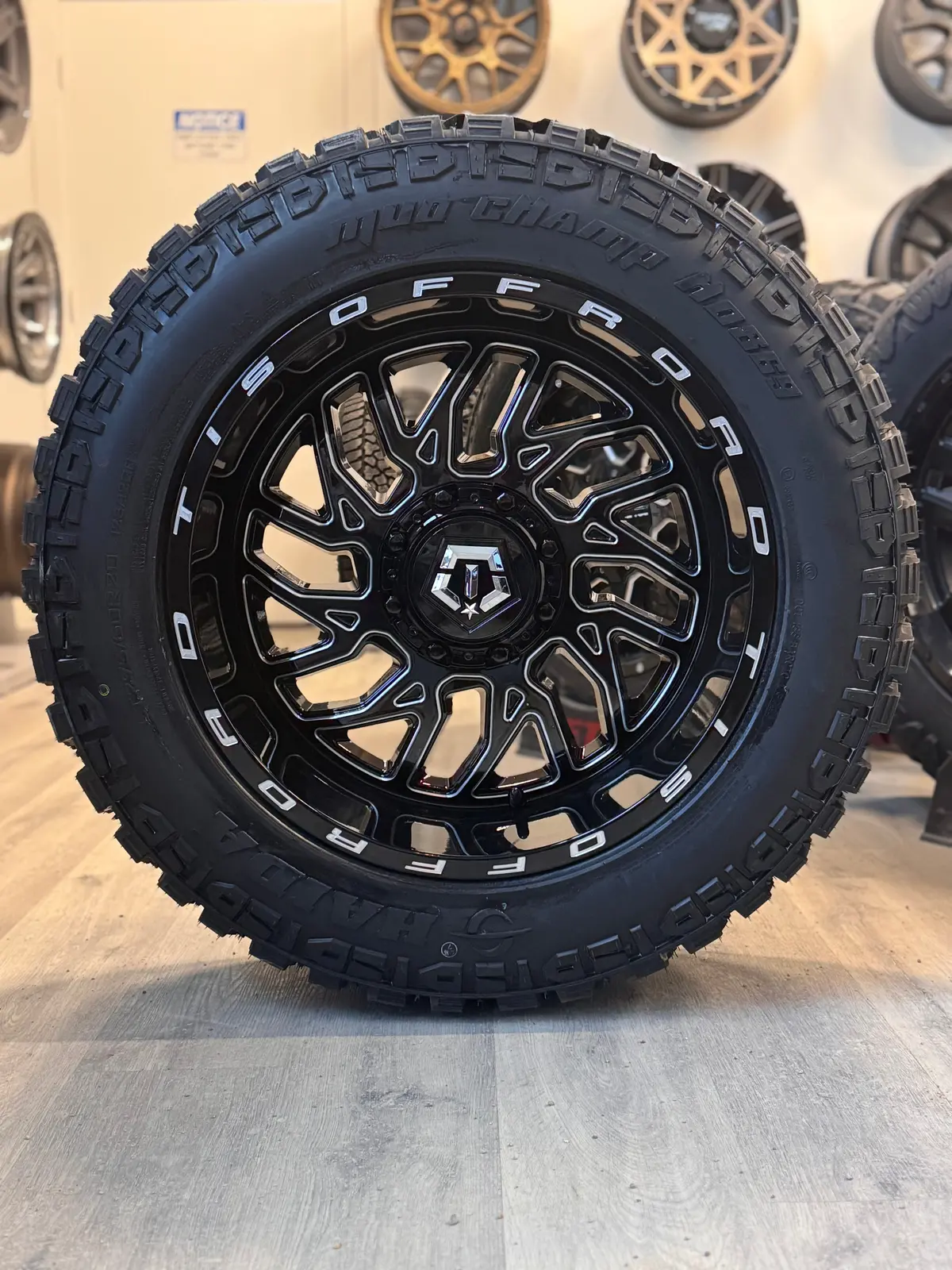 (Set Of Four) Tis 544 Gloss Black - Milled Edge 20X10.0 -25 6X135/6X139.7Mm 108.1Mm | 275/60R20 Haida 869 Mud Champ 3Pms 1