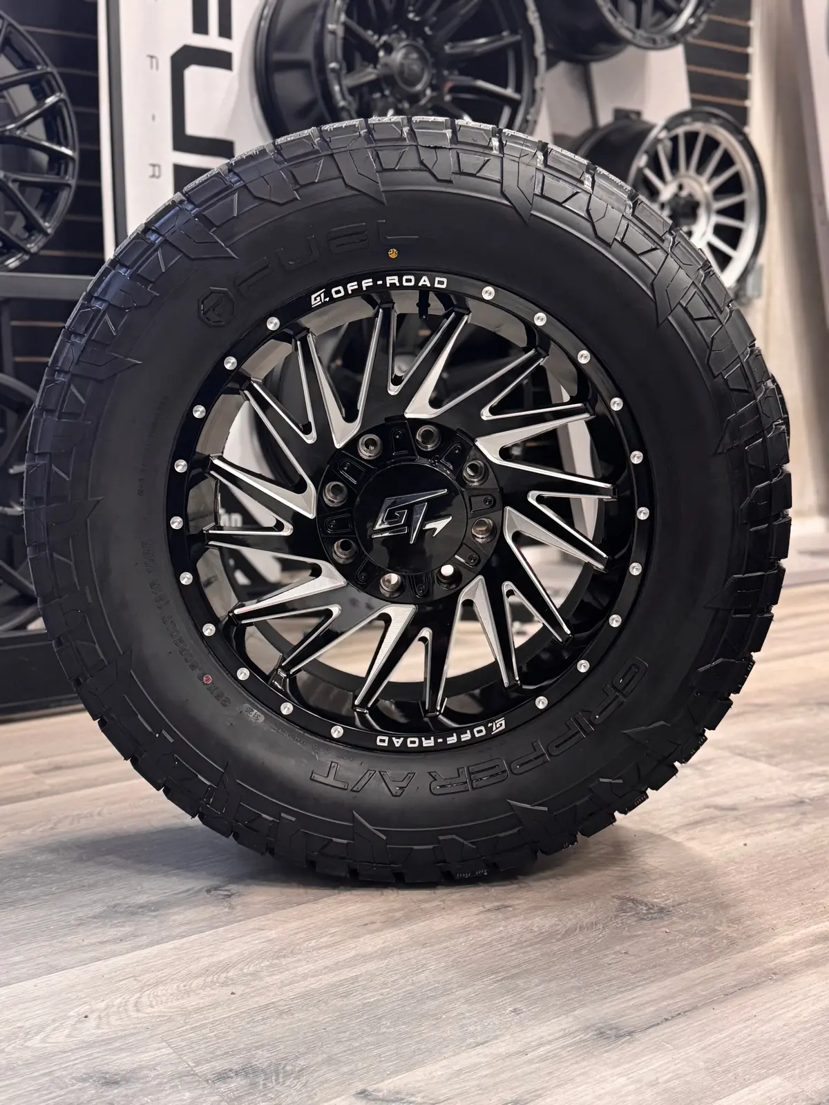 (Set Of Four) Gt Off-Road Tomahawk Gloss Black Milled 20X9 +12 8X165.1 / 8X180mm | 35X12.50R20 Fuel Gripper At 10Ply 1