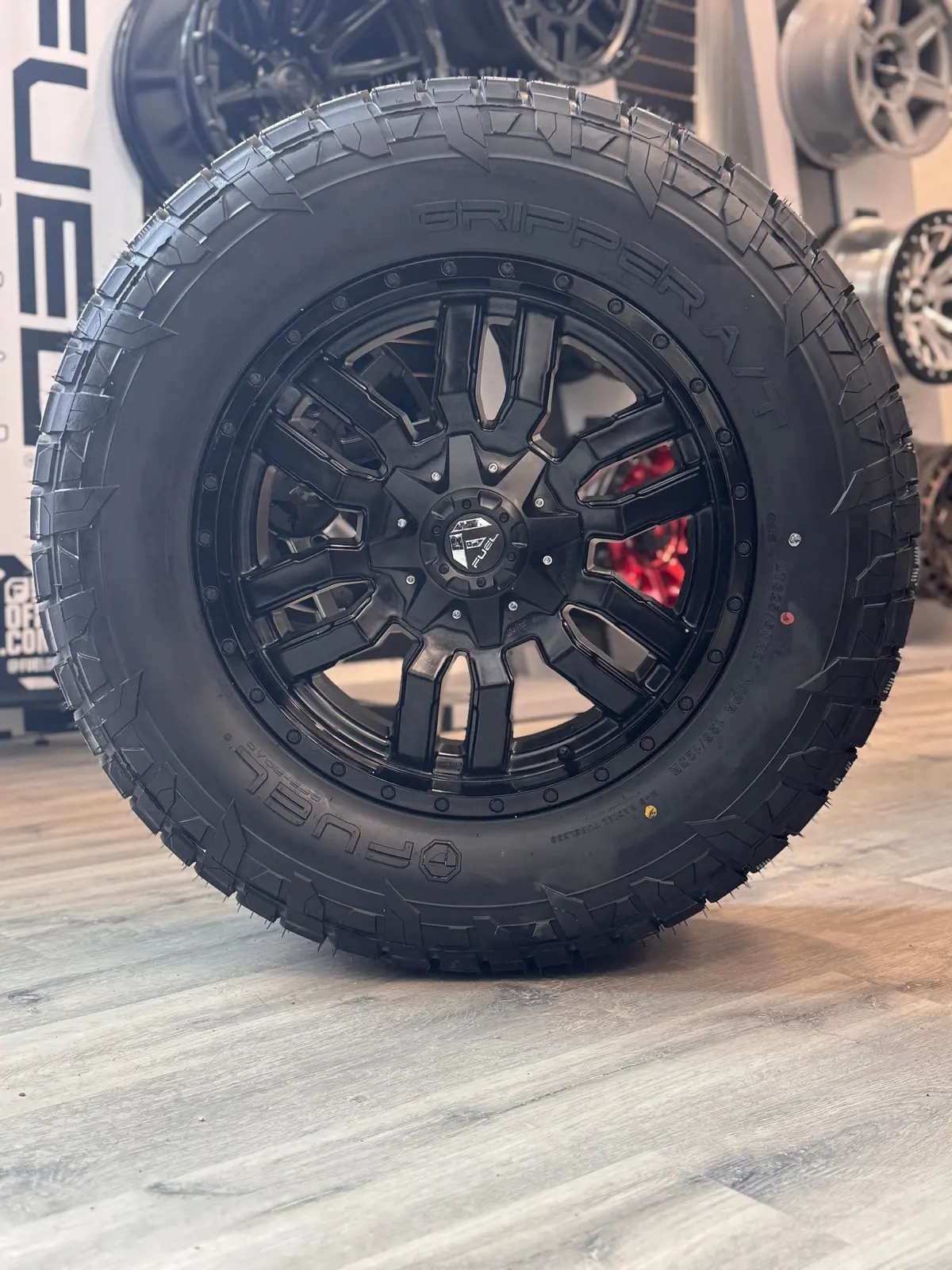 (Set Of Four) Fuel Sledge 20X9 8X180 +20 Matte Blk/Gloss Blk Lip | Fuel Gripper A/T Lt 10 Ply 35X12.50R20 1