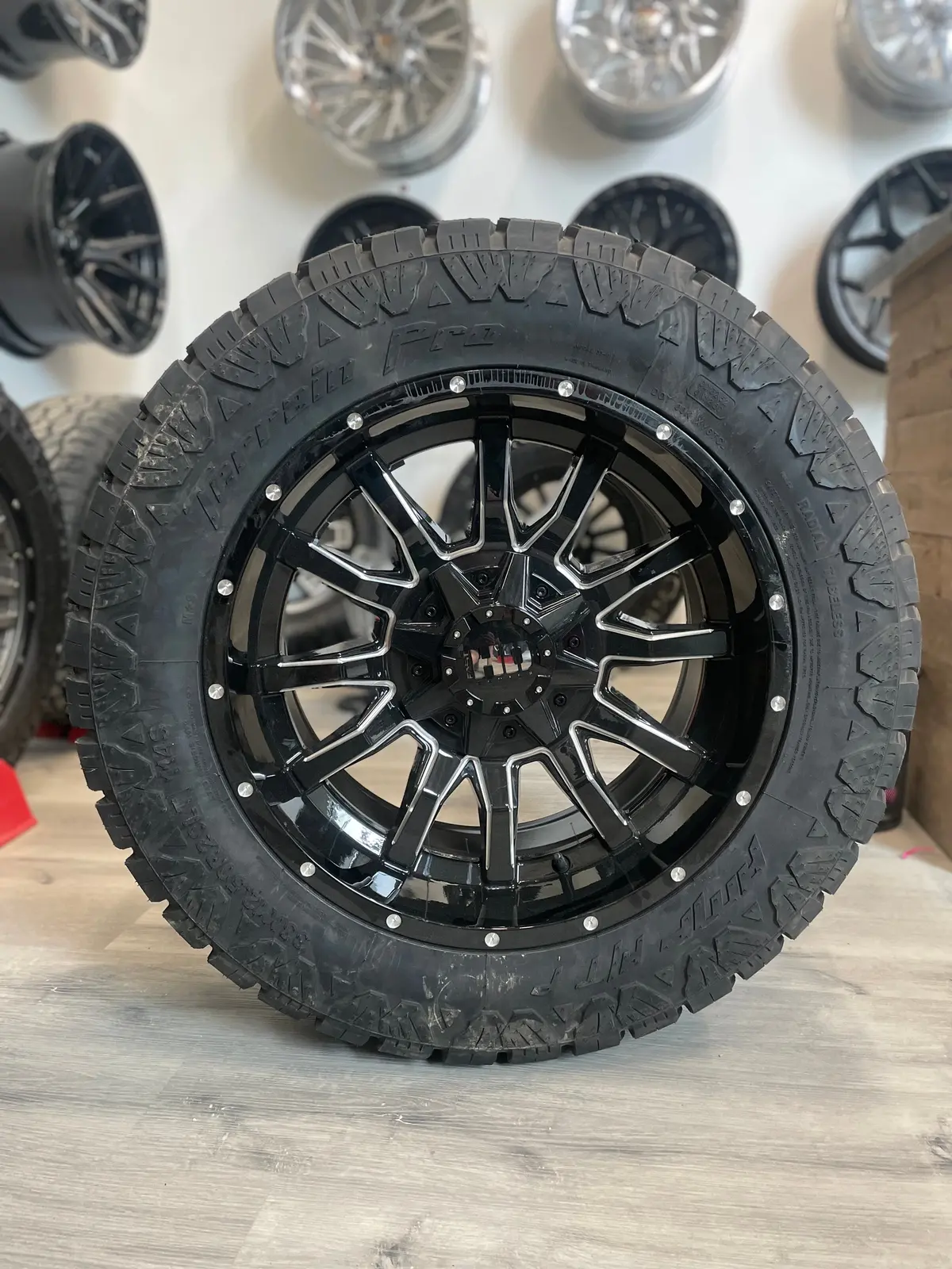 (Set Of Four) Fast Traxx 20X10 8X165.1 -15 Gloss Blk Milled | 33X12.50R20 Amp Terrain Pro ( Ram 2500, Gm 2500 ) 1