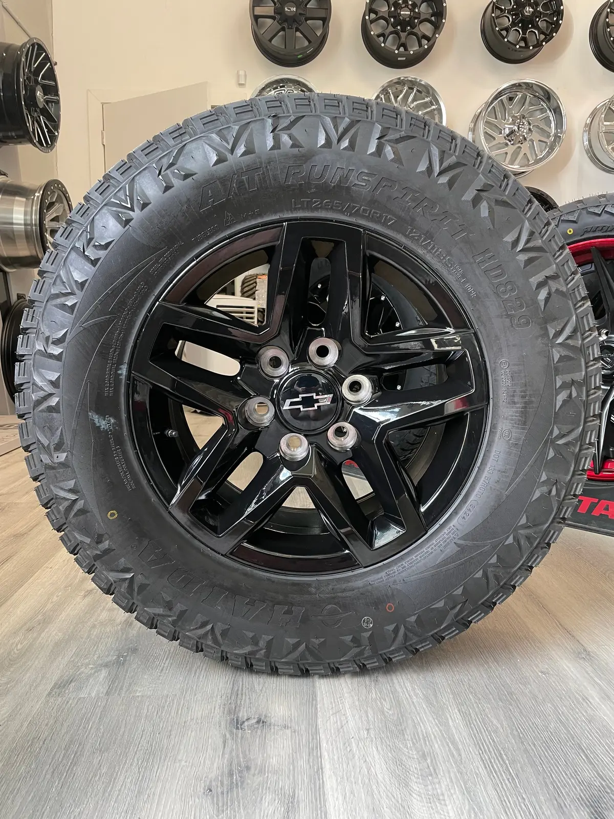 (Set Of Four) Chevy Trailboss Oem Reps 17X8 6X139.7 +24 Gloss Blk | 265/70R17 Haida 829 3Pms ( Sierra, Silverado, Ram ) 1