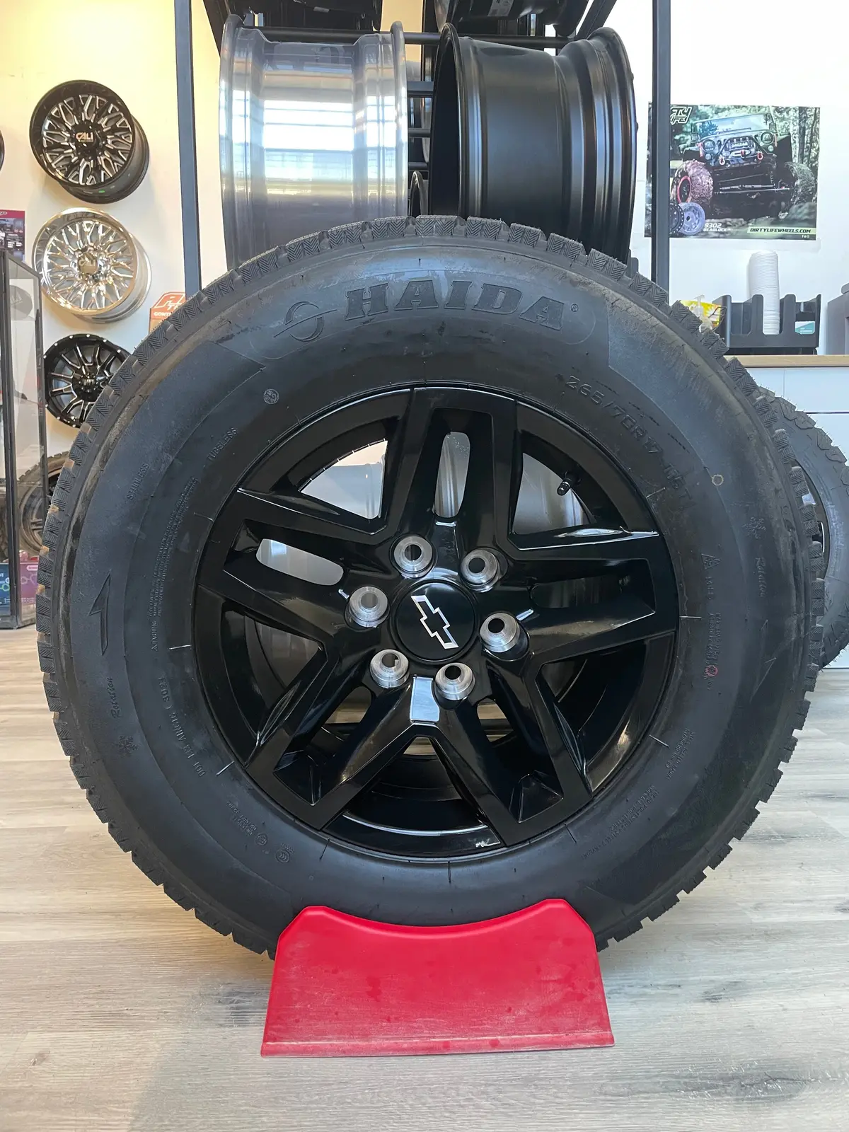 (Set Of Four) Chevy Trailboss Rep 17X8 6X139.7 +24 Gloss Blk | 265/70R17 Haida 617 Winter ( Ram, Sierra, Silverado, Tahoe, Yukon ) 1