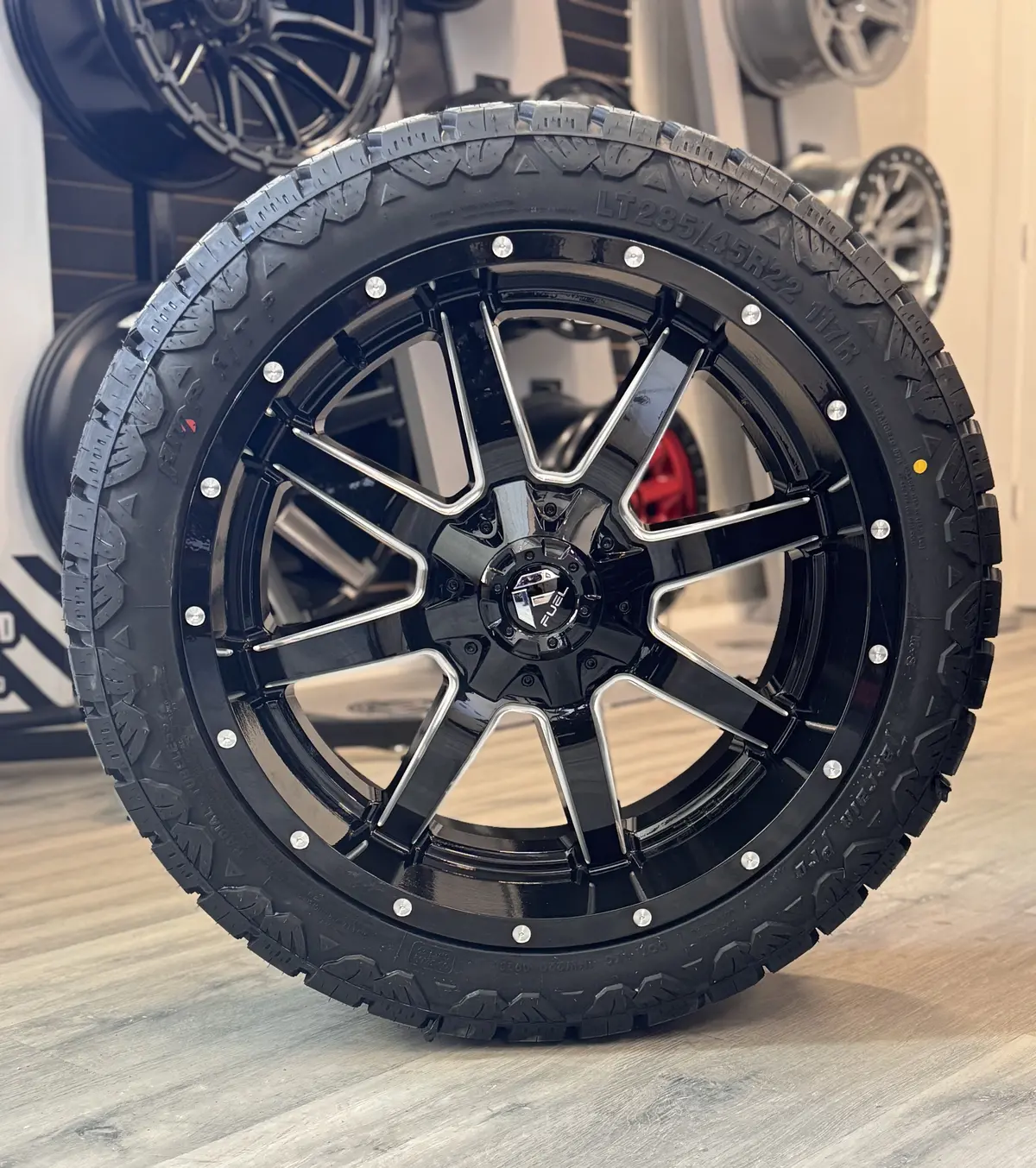 (Set Of Four) Fuel Maverick Gloss Black Milled 22X10 6X135/6X139.7 +10 106.1Mm | Amp Terrain Pro A/T | Lt285/45R22 1